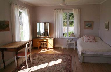 Chambre avec po�le et lit large 