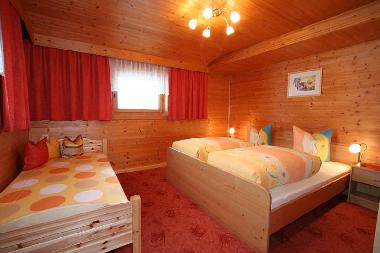Chambre pour trois personnes.