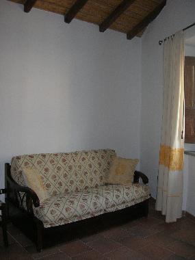 le salon avec le canap lit