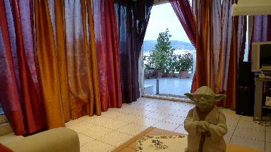Vue du lit sur la sortie de veranda