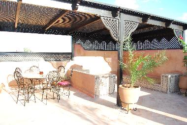 Pergola qui donne une vue vers le golf Atlas Golf