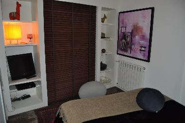 bedroom with balcony