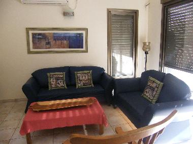 Le salon et sa sortie au jardin