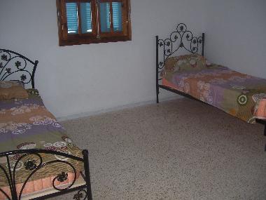 un des 4 chambres � coucher � 2 lits
