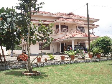 Maison de vacances �/en/au Vandanmedu (Kerala)ou appartement ou maison de vacances