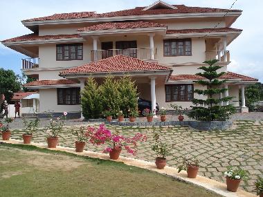 Maison de vacances �/en/au Vandanmedu (Kerala)ou appartement ou maison de vacances