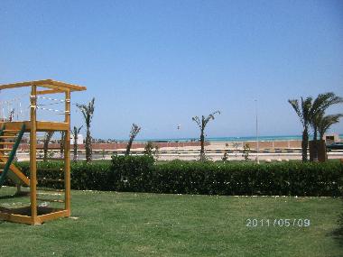 Jardin de la residence face a la mer