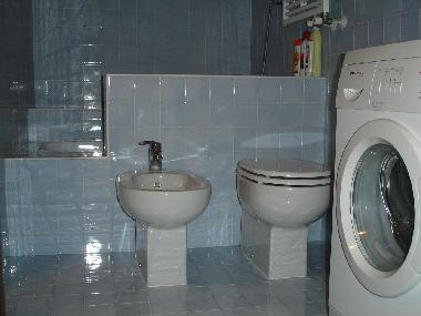 bathroom with washing machine