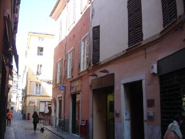 borgo Venti Marzo with the Baptistery of Antelami