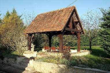 loggia "LASCAUX" avec barbecue en pierre.