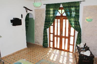 Sortie sur la terrasse de la chambre Africaine