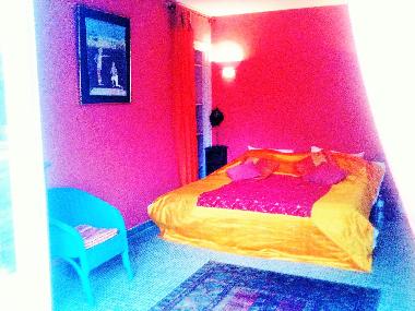 chambre orange donnant sur le jardin