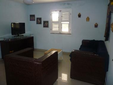 Salon ouvert sur une terrasse avec 1 lit double - Appartement 1er etage