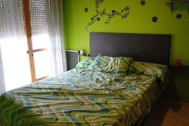 chambre double avec grand lit et sa terrasse