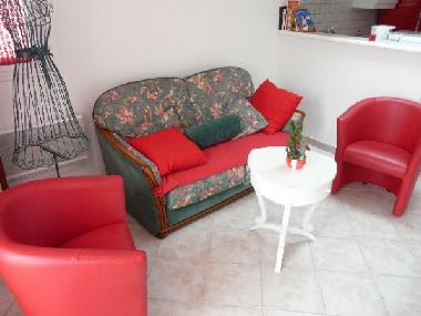 salon avec uncouchage supplmentaire